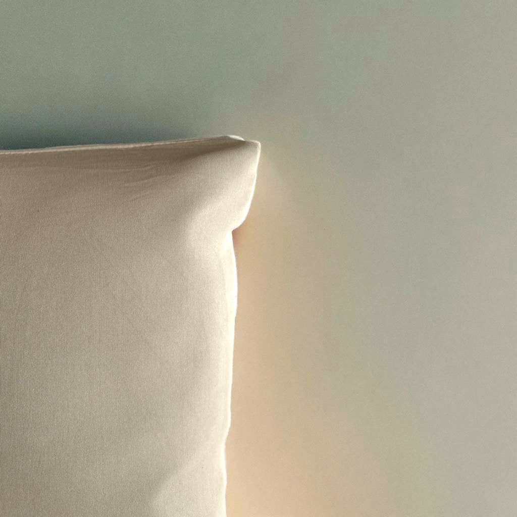 Housse de coussin beige