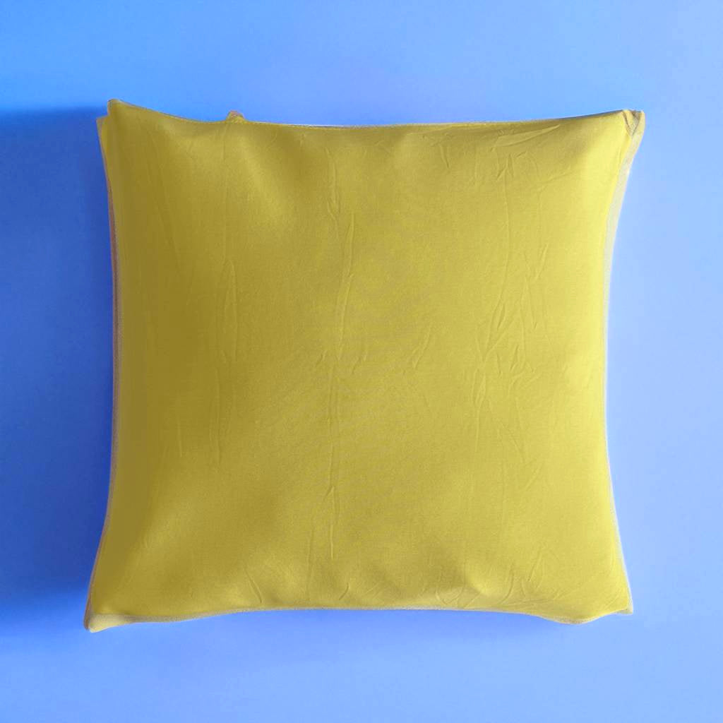 Housse de coussin jaune