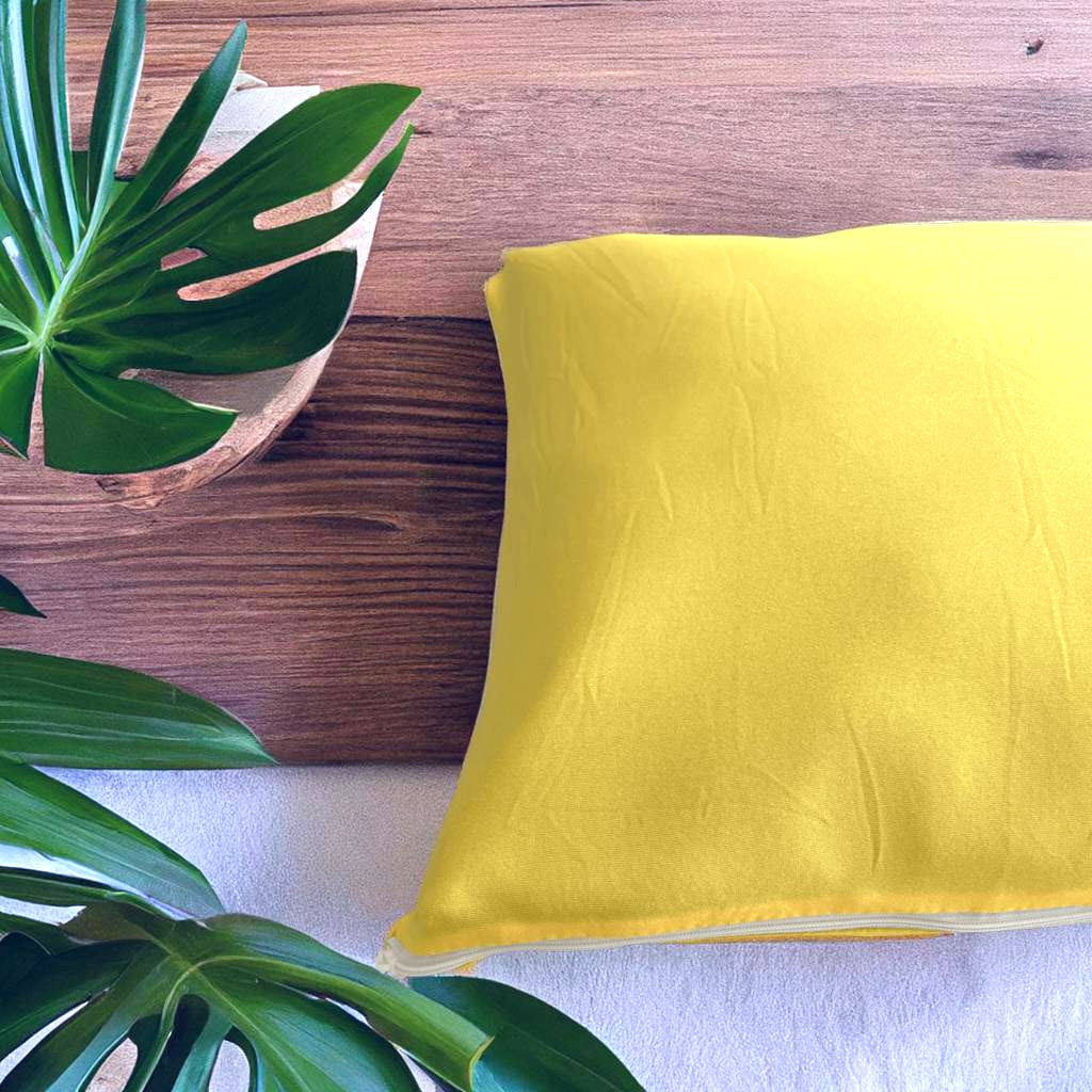 Housse de coussin jaune