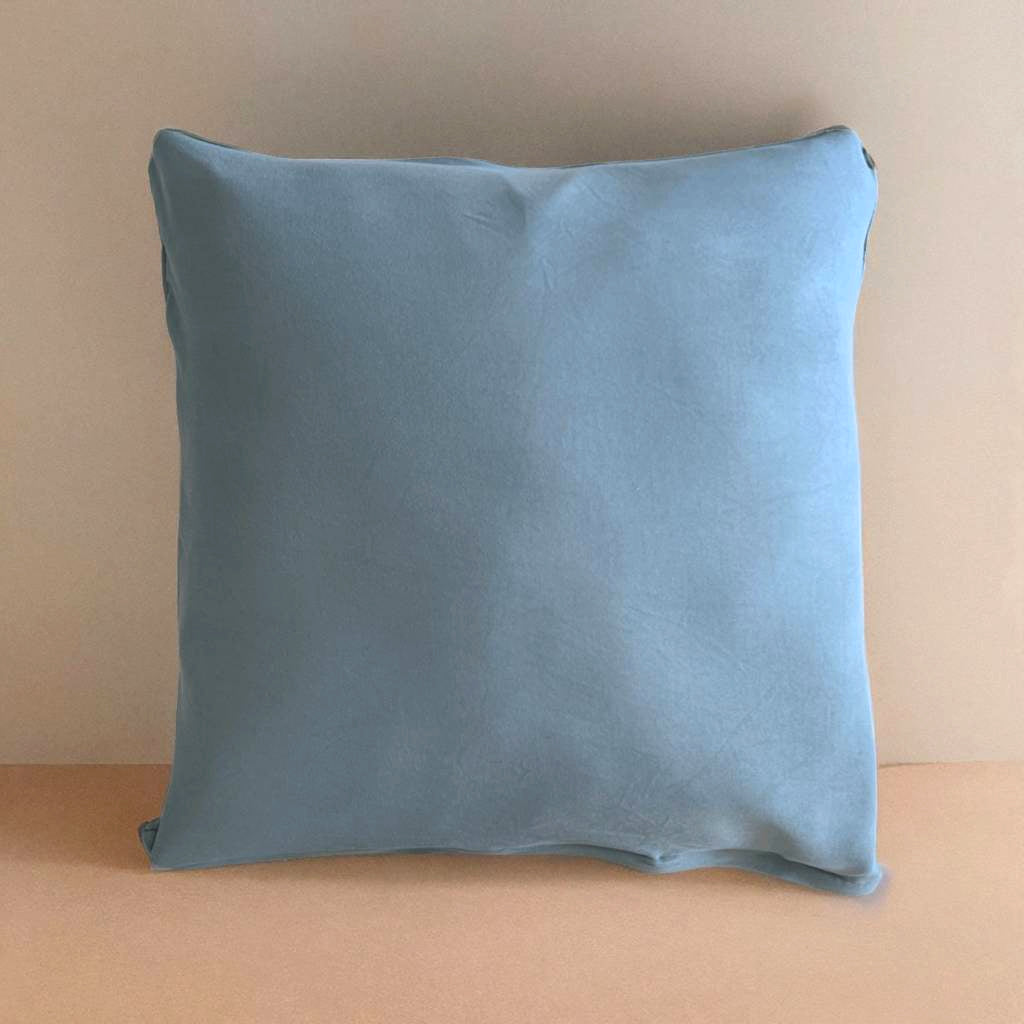 Housse de coussin bleu clair