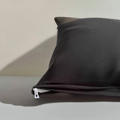 Housse de coussin noire